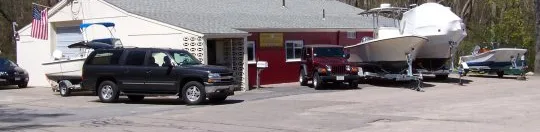 The Building 21 shop in Rockland, Massachusetts, with boats parked out front